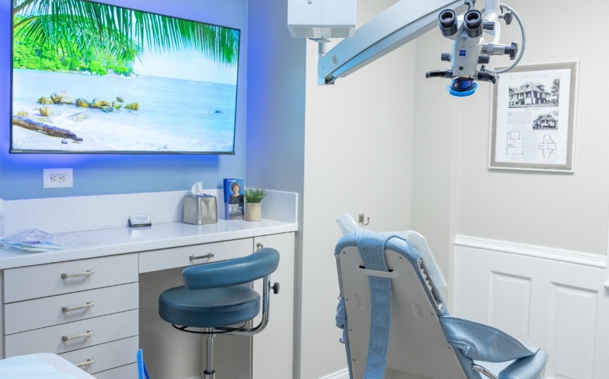Dental treatment chair with television mounted on the wall