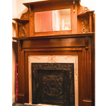 A Sears craftsman fireplace from 1910 in the historic building of Associated Endodontist of Melbourne